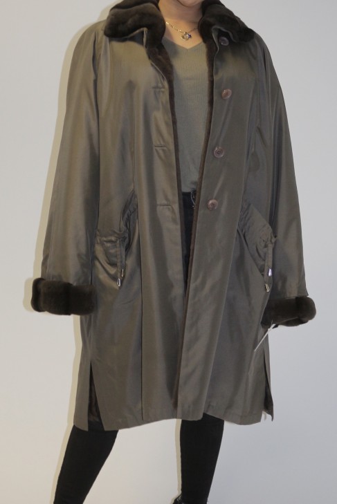Fur coat inside lining weasel, outside fabric